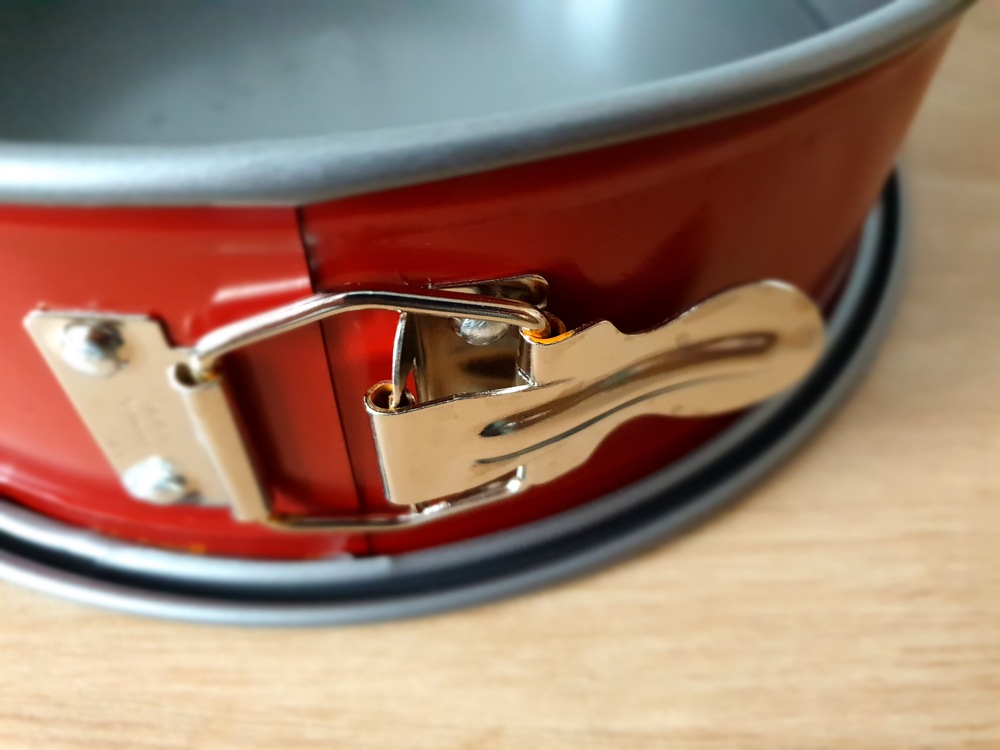 Formă de copt ovală extensibilă Tefal DELIBAKE 30x11 cm roșu