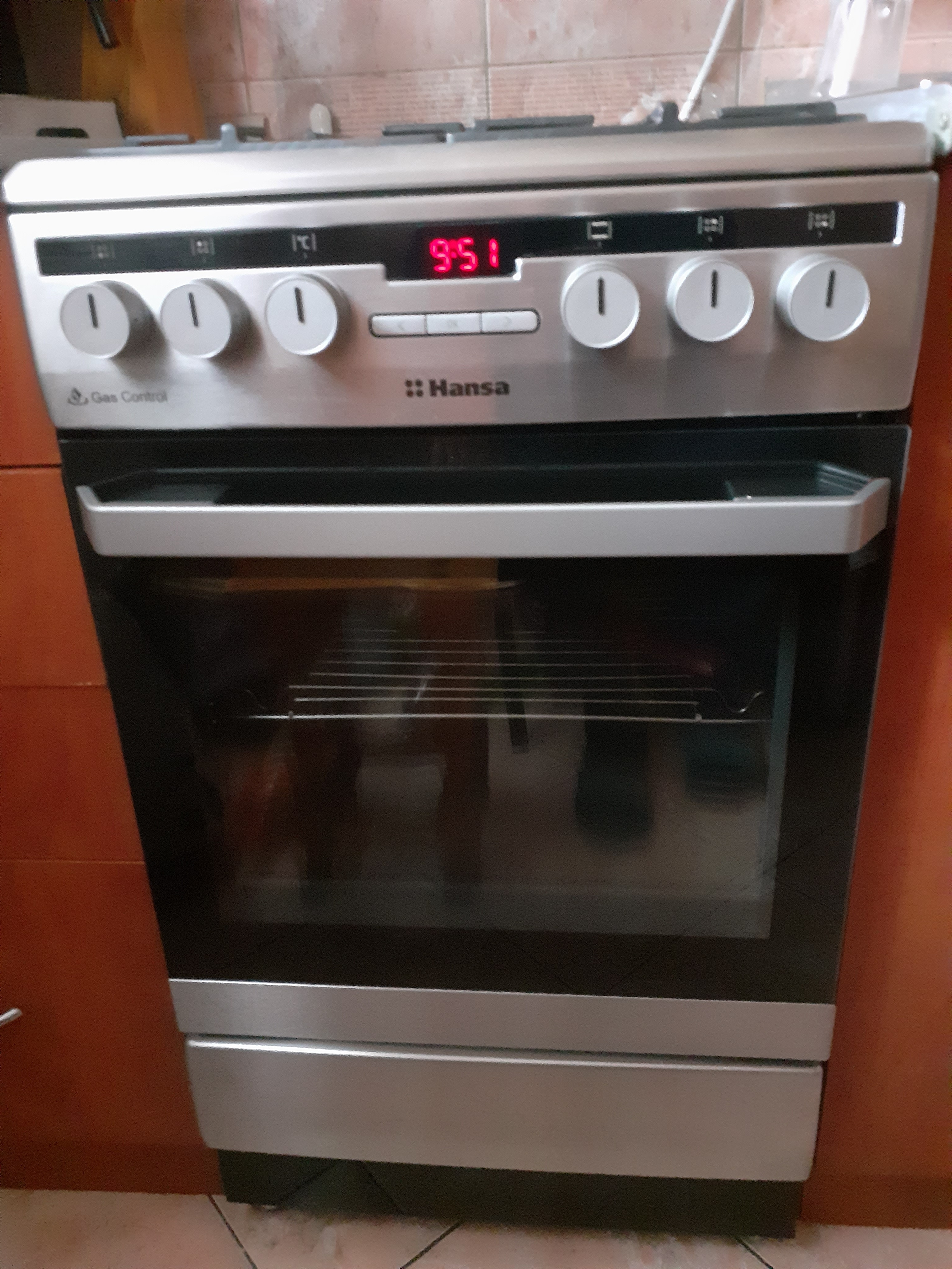 Aragaz Hansa FCMX59221, 4 arzatoare, Mixt, Curatare abur, Grill, Rotisor, Clasa A, 50 cm, Inox