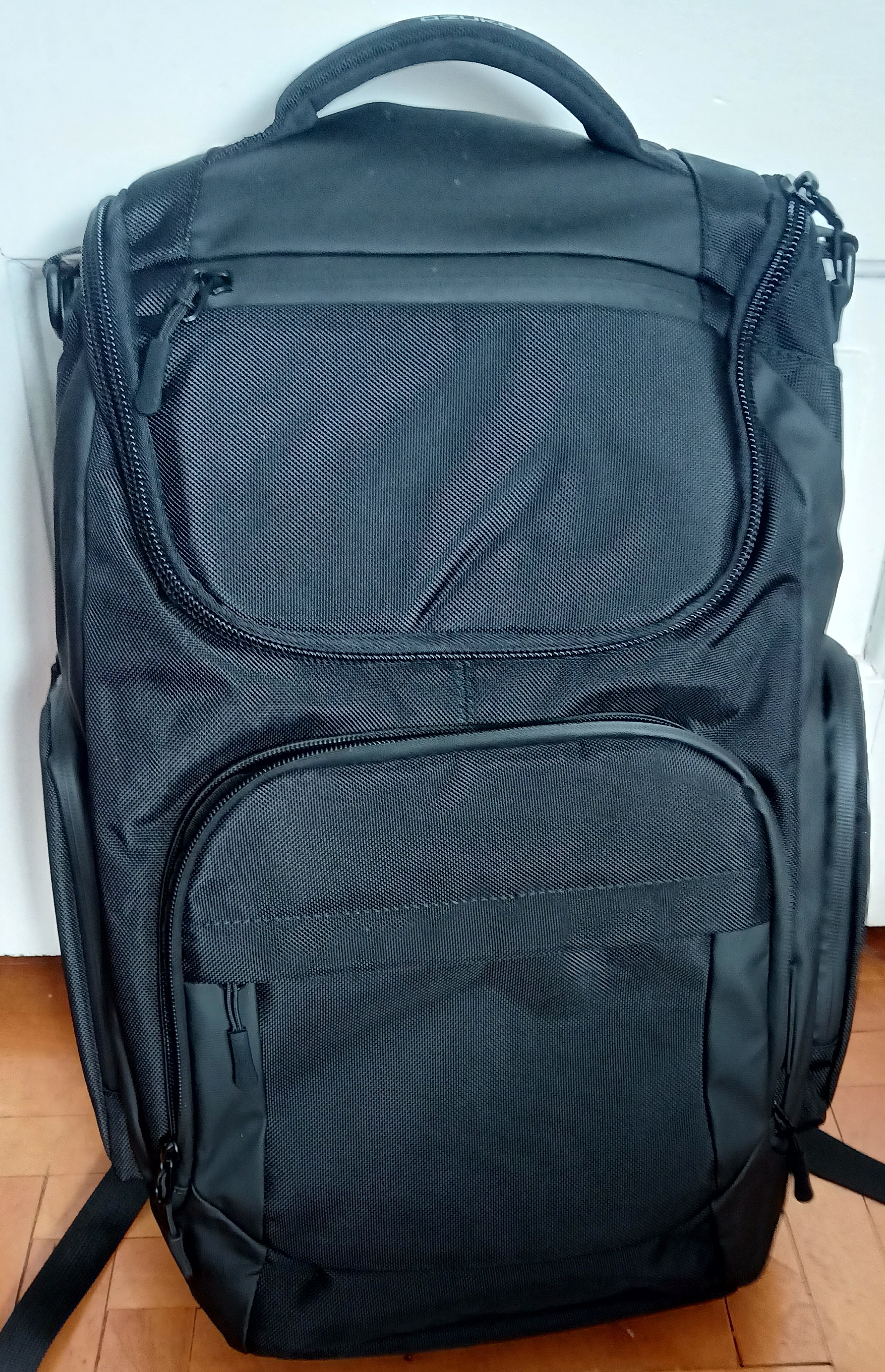 Rucsac laptop 15,6 inch, multifunctional, rezistent la stropi de apa, sistem fixare pe valiza, buzunar antifurt, buzunare multiple, OZUKO, OZ9409BK, Negru