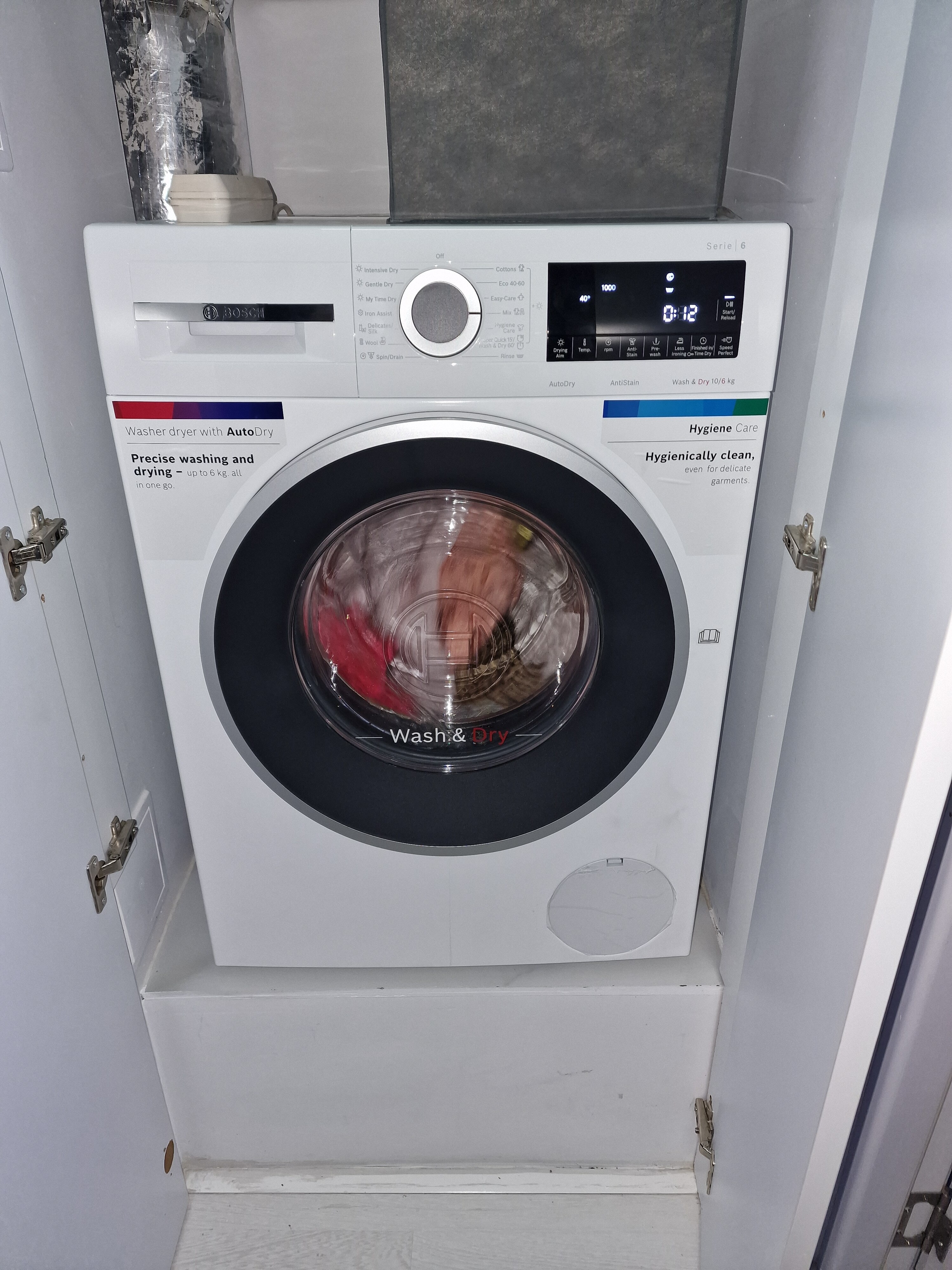 Masina de spalat rufe cu uscator Bosch WNG254U0BY, 10 kg spalare, 6 kg uscare, 1400 RPM, Clasa C, EcoSilence Drive, AutoDry, ActiveWater, Alb