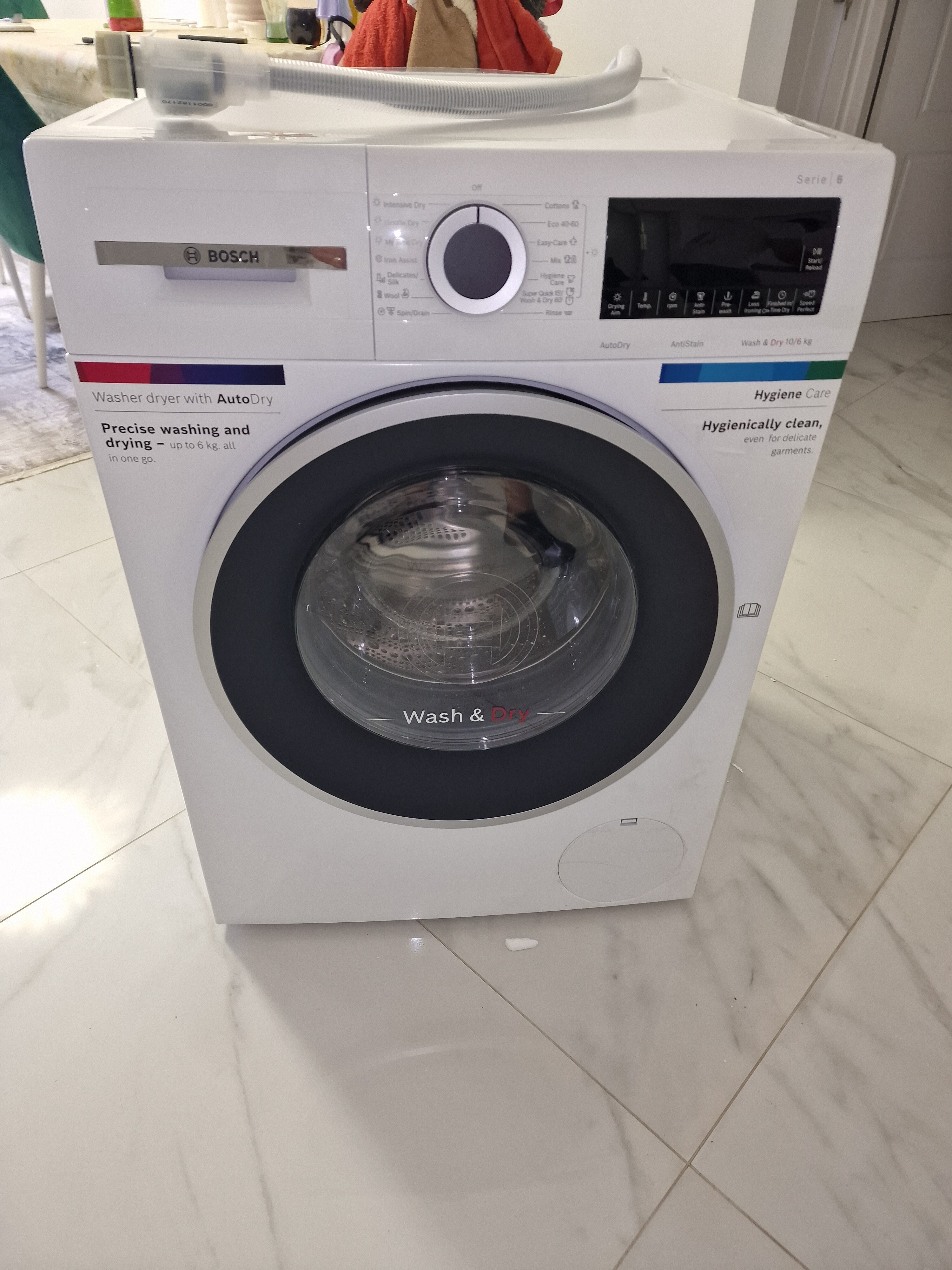 Masina de spalat rufe cu uscator Bosch WNG254U0BY, 10 kg spalare, 6 kg uscare, 1400 RPM, Clasa C, EcoSilence Drive, AutoDry, ActiveWater, Alb