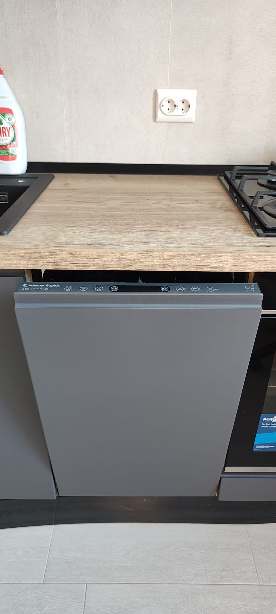 Masina de spalat vase incorporabila Candy Rapido CI0C7SB0FA, 10 seturi, 8 programe, Clasa C, WiFi, Motor inverter, Wash & Dry 35', Automatic Open Door, 45 cm