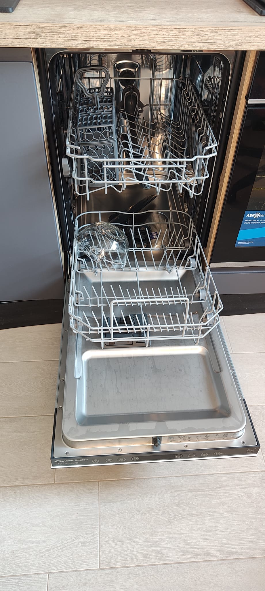 Masina de spalat vase incorporabila Candy Rapido CI0C7SB0FA, 10 seturi, 8 programe, Clasa C, WiFi, Motor inverter, Wash & Dry 35', Automatic Open Door, 45 cm