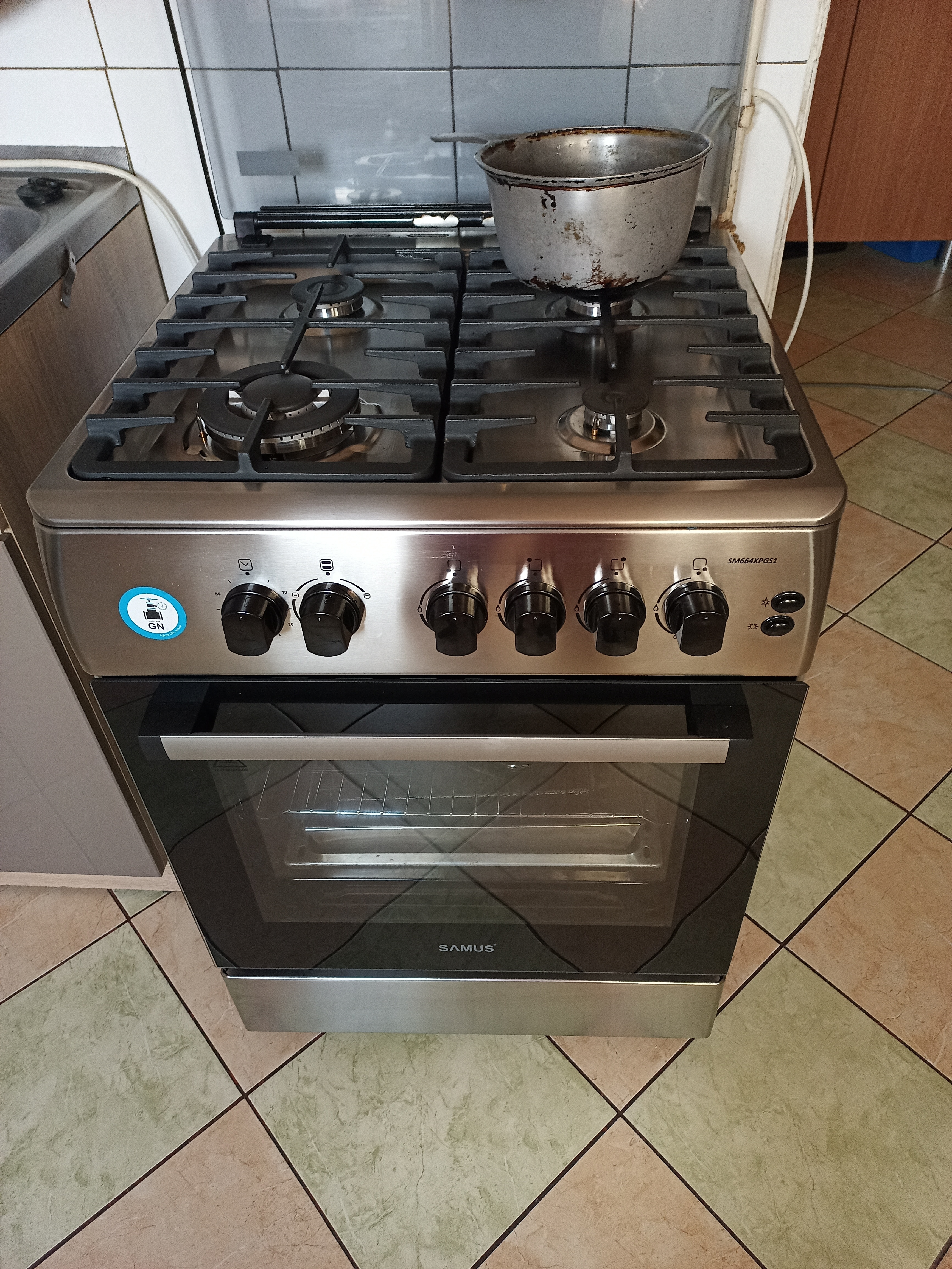 Aragaz Samus SM664XPGS1, 4 arzatoare gaz, cuptor gaz, aprindere electrica plita, timer, grill, sigurante plita si cuptor, Inox/laterale argintii