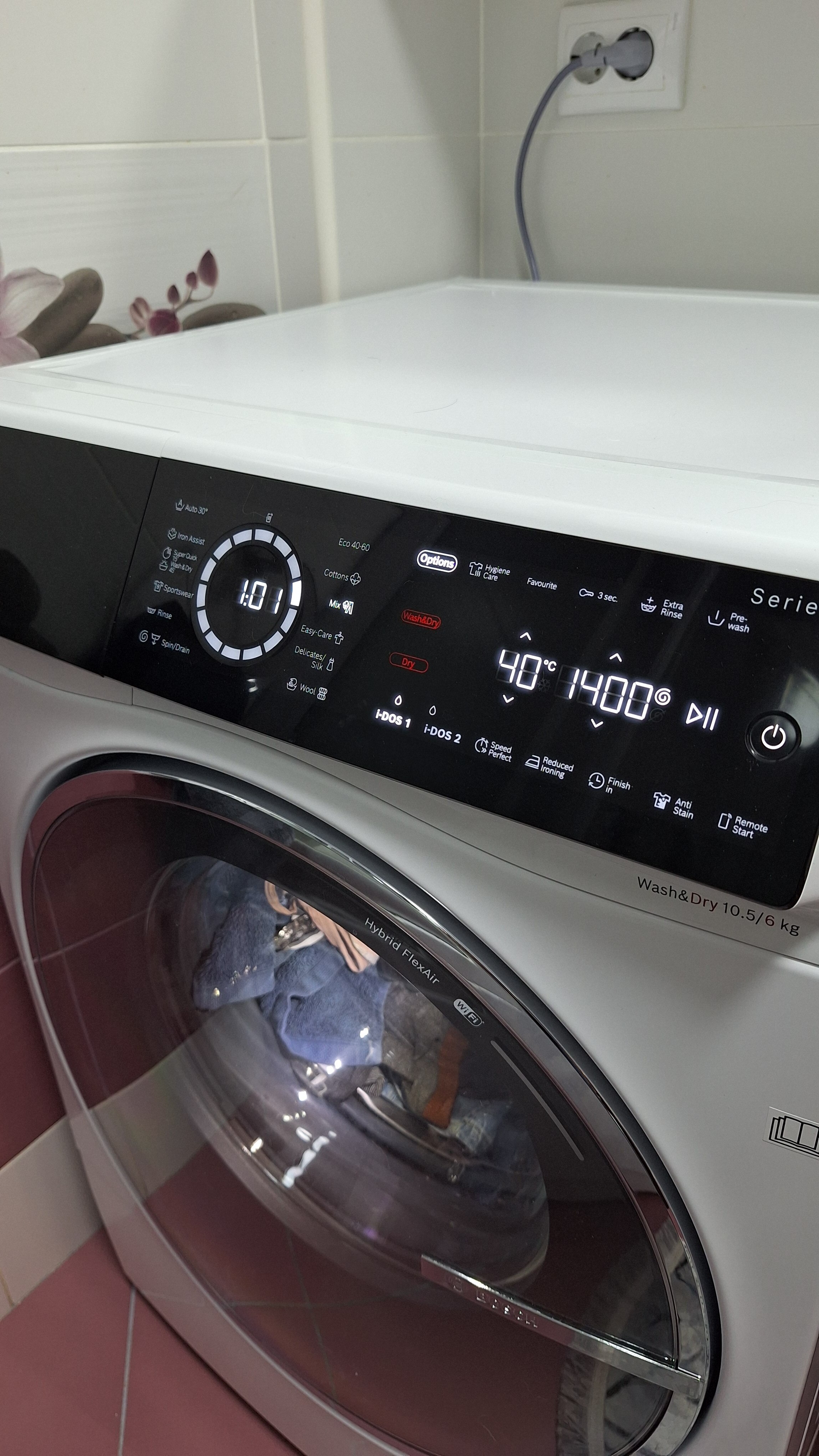 Masina de spalat rufe cu uscator Bosch Seria 8 WNC254A0BY, Spalare 10 kg, Uscare 6 kg, 1400 rpm, Clasa A, i-DOS, Iron Assist, Home Connect, Anti Stain, Auto Dry, Motor EcoSilence Drive, Alb