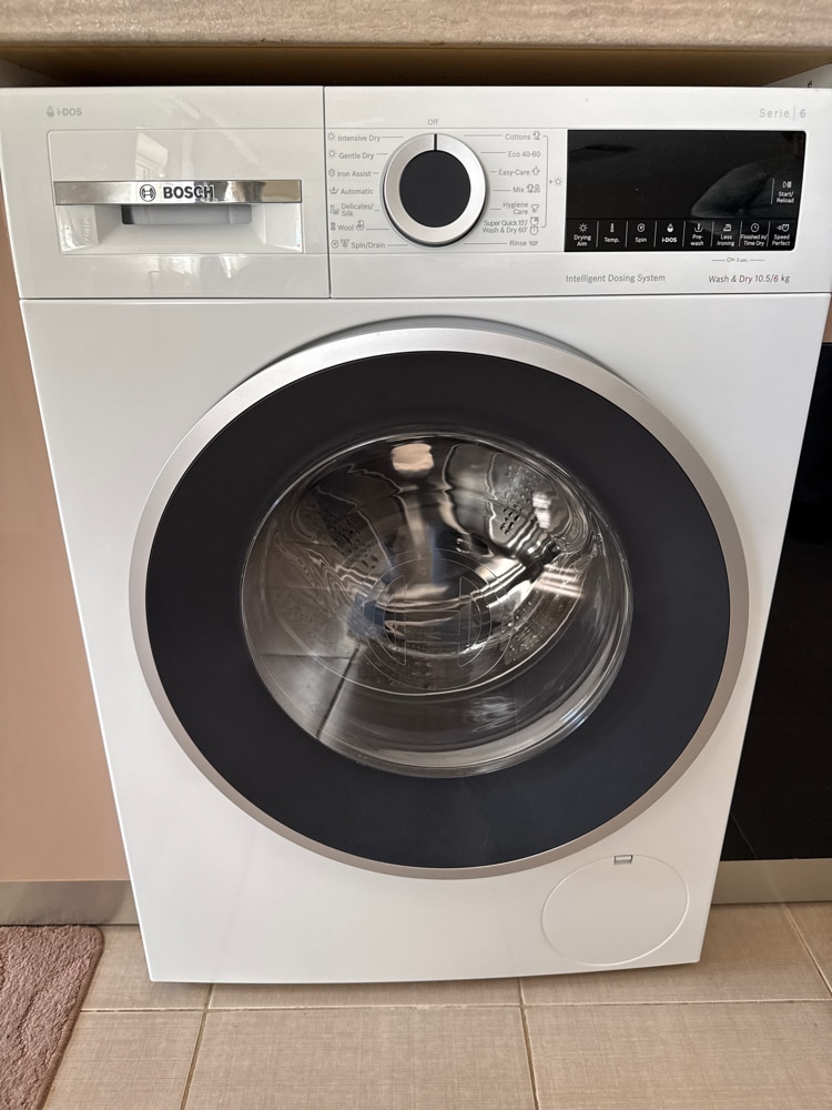 Masina de spalat rufe cu uscator Bosch WNG254A0BY, Spalare 10.5 kg, Uscare 6 kg, Clasa A, i-DOS, Iron Assist, AutoDry, Speed Perfect, Motor EcoSilence Drive, 60 cm, Alb