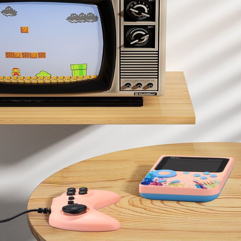 Consola Portabila, ecran LCD, mai mult de 500 de jocuri, joc dublu, conexiune TV de sprijin, roz