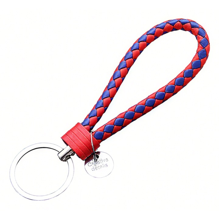 Breloc impletit din piele ecologica (PU), rosu-albastru, inspirat de drapelul Romaniei, cu inel metalic si bucla de mana, pandantiv decorativ