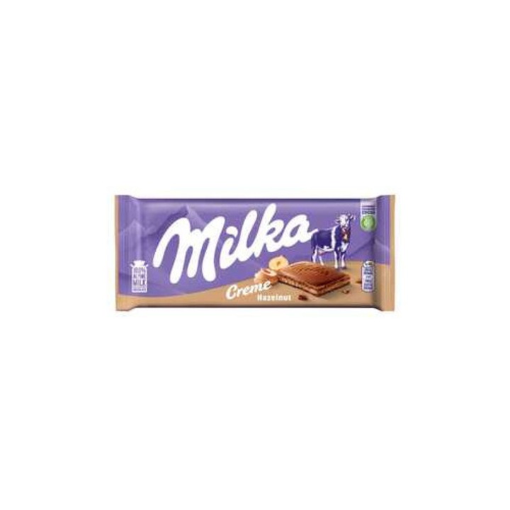Ciocolata Milka, cu lapte alpin, crema de alune de padure, 85g