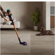 Aspirator vertical fara fir Dyson V16 Piston Animal™ 492963-01, 900W, putere aspirare 315AW, autonomie pana la 70 minute, filtru HEPA, luminare LED, perii anti-incurcare, 2 accesorii, matte black/copper