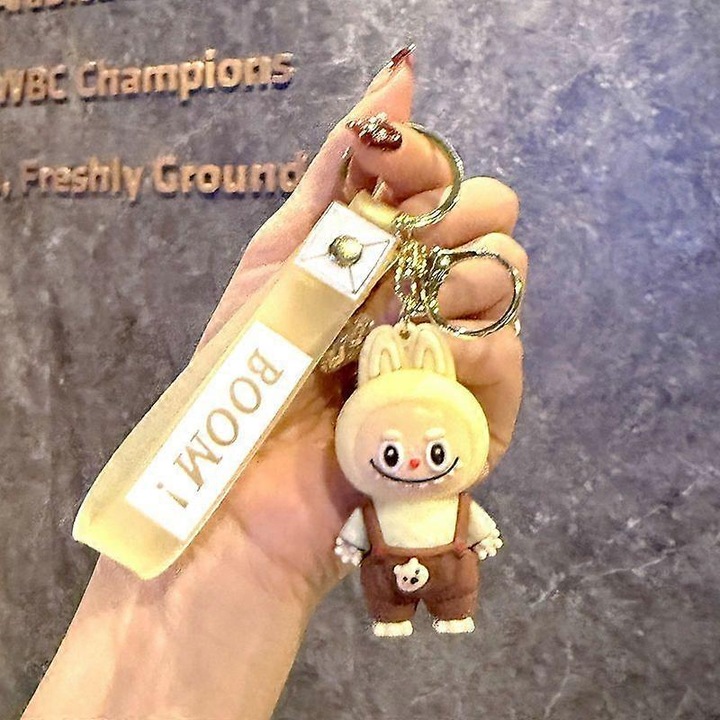 Breloc pentru rucsaci, Labubu, galben deschis, design dragut, din silicon PVC si metal