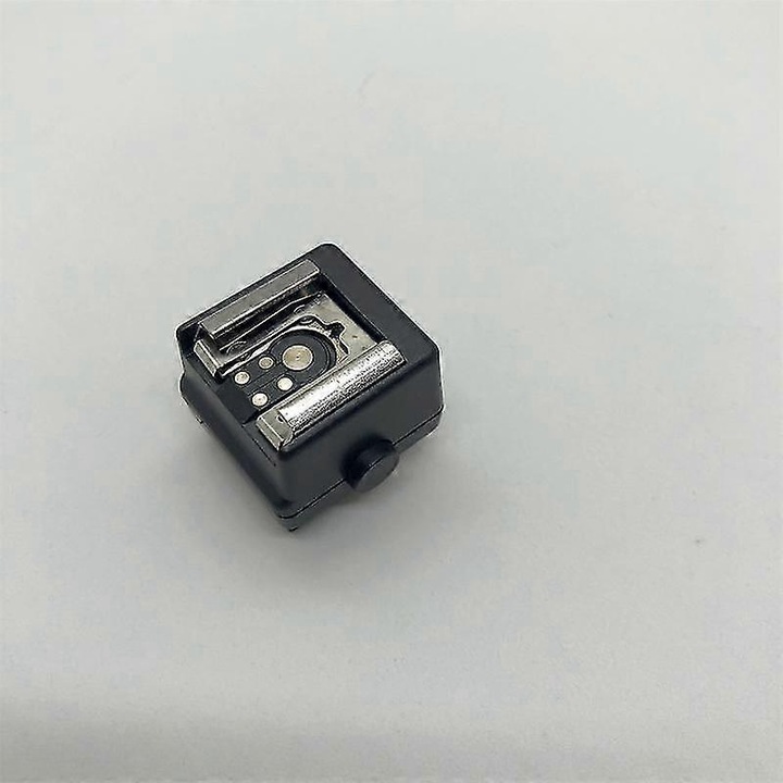 Adaptor pentru blit Sony, model HD-N3, compatibil cu camere Sony si Minolta, culoare neagra, dimensiuni compacte.