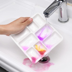 Acuarele, pensule si blocuri de desen