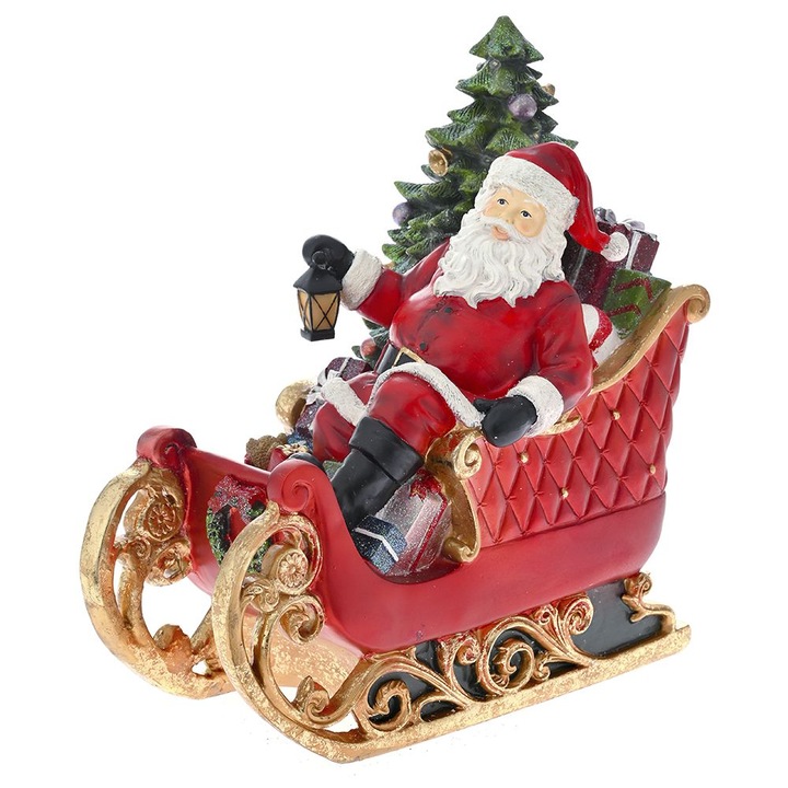 Decoratiune Mos Craciun pe sanie, cu LED, polirasina, inaltime 35 cm