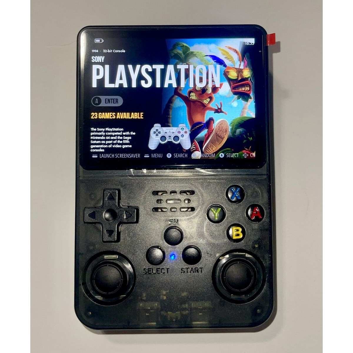 Consola retro portabila R36S 64GB cu jocuri, 15000 jocuri, ArkOS 2.0, IPS LCD 3.5" 640x480, CPU RK3326, GPU MALI-G31MP2, 1GB DDR3L, Emulator N64 PSP PS1 PlayStation Sega, Negru Transparent