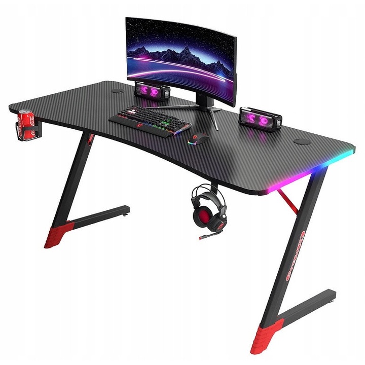 Birou De Gaming Cu Iluminare RGB, Ekspand, 120x60x74 cm, Blat 15 mm, Finisaj Carbon, Cadru Solid Din Otel, LED RGB Pe Laturile Blatului – Alimentare Prin Usb 5V, Suport Pentru Cana, Carlige Pentru Casti, Negru