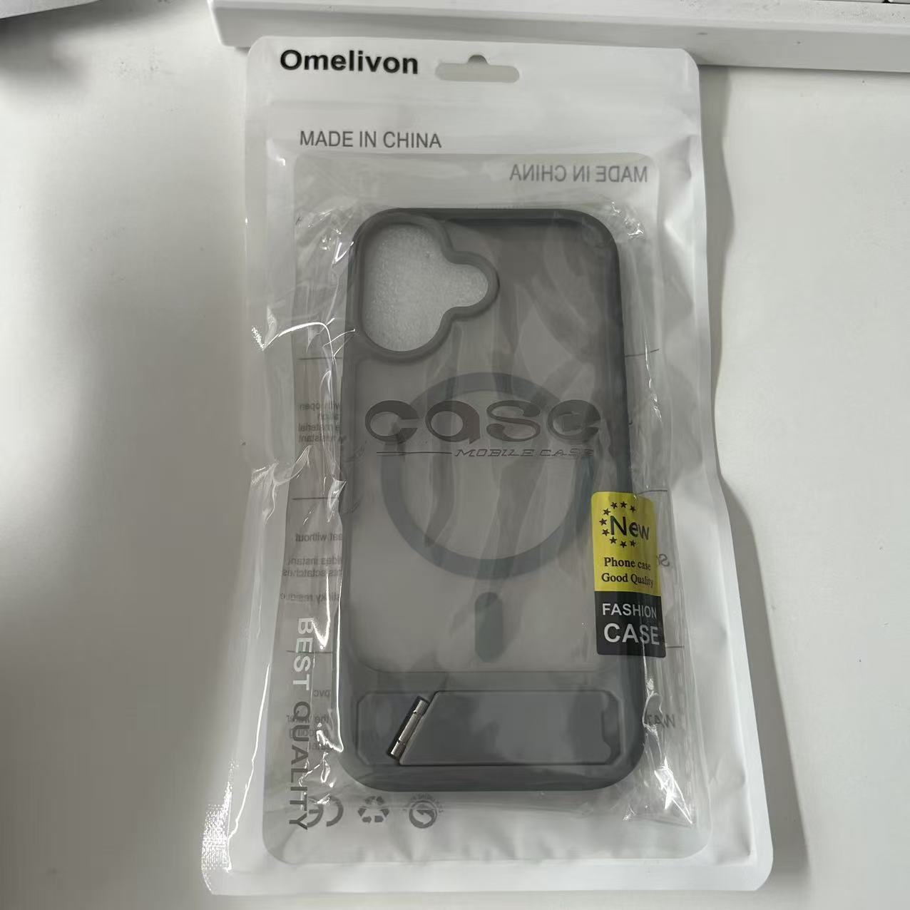 Husa de protectie pentru iPhone 17, Omelivon, MagSafe, cu Suport ajustabil, Margini ridicate pentru protectia ecranului, Anti-Soc, Decupaje Precise, Incarcare Wireless, Spate Semitransparent, Gri inchis