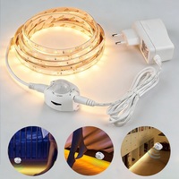 Banda LED, DONFANLIA®, Alb cald, 4m, 240 lumini, 12V, Senzor miscare, Flexibila, Eficient energetic, IP65 rezistent la apa, 2835SMD, Durata iluminarii este reglabila, Iluminare versatila