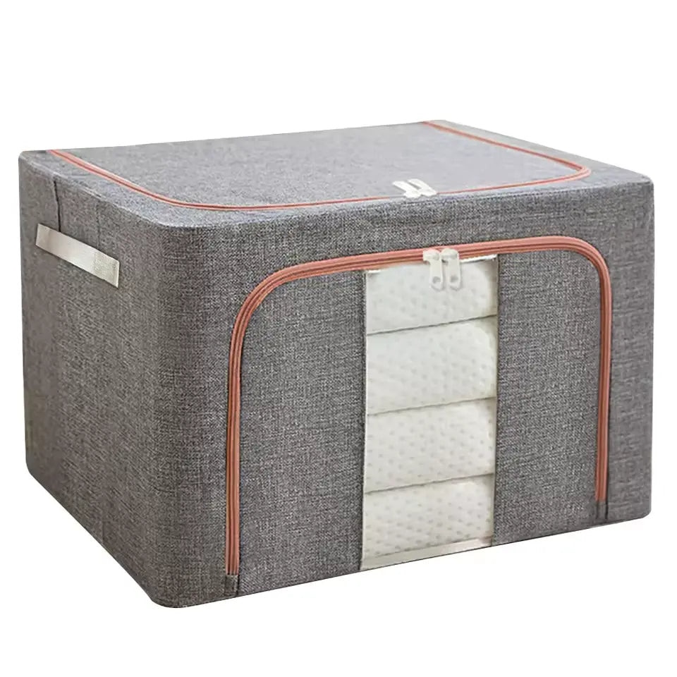 Organizator depozitare Macvi® 100 litri, cutie textila pliabila cu capac si fermoar, panou transparent pentru vizualizare si cadru metalic robust, ideala pentru haine voluminoase si depozitare