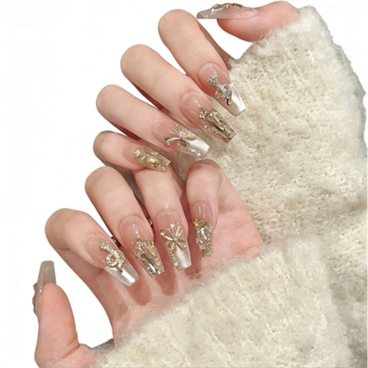 Design 3D original: fluture devorand un sarpe auriu. Armura purtabila realizata manual, realista si naturala. Reutilizabila. Set de zece piese, inclusiv instrumente pentru aplicare si indepartare