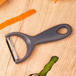 Set 4 curatitoare legume si fructe din otel inoxidabil, manere ergonomice, lame ascutite, usor de curatat