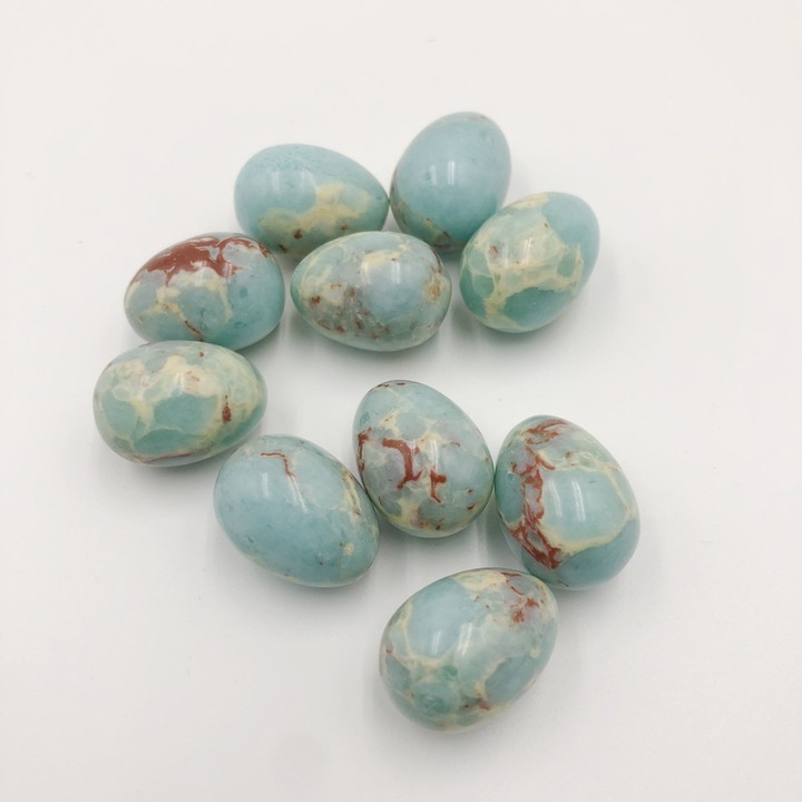 Set 5 oua decorative din jad de sediment marin, turcoaz cu modele crem si rosu, 15x20mm