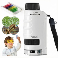 Microscop de Buzunar Portabil pentru Copii, Marire Reglabila 60X-120X, cu Lumina LED si UV, Lentile Asferice, Carcasa ABS Rezistenta, Snur Inclus, Ideal pentru Explorari Stiintifice si Cadou Educational, Alb