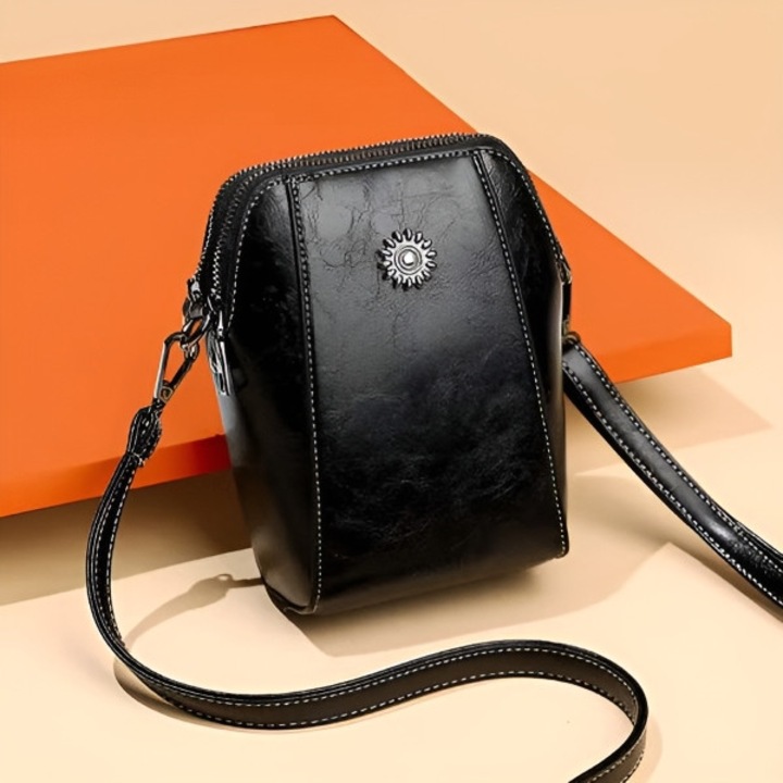 Crossbody táska, ideális telefonnak, stílusos megjelenés, biztonságos tárolás és könnyű hozzáférés, mindennapi használathoz, állítható vállpánttal - SUNIBAG fekete VIVVA®