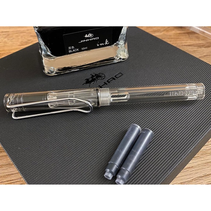 Jinhao 599 Rhapsody átlátszó golyóstoll, 5 kék patron, 0.5mm