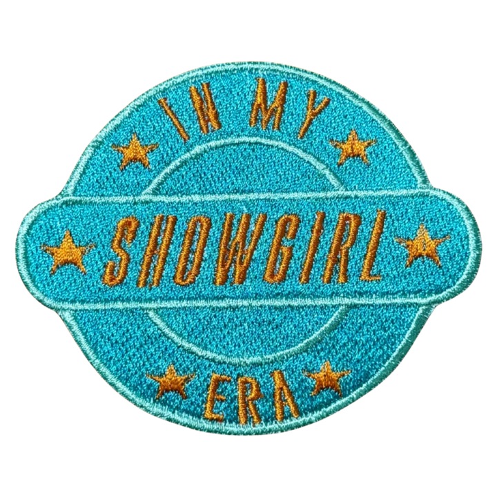 Textil felvarró, hímzett, hőre ragasztható, album formájú, kék és narancssárga, "The Life of a Showgirl - In My Showgirl Era"