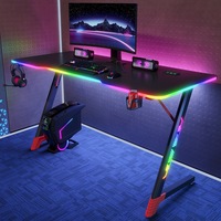 Birou Gaming RGB QOVA®, Iluminare LED integrata pe 3 laturi + picioare, Blat Carbon Premium, Suport 120KG, Dimensiune 100x60 cm, Suport Pahar & Casti, Design Ergonomic pentru Gaming & Office, Negru