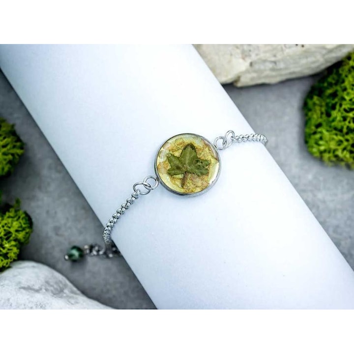 Aranyos borostyán levélke műgyanta acél karkötő