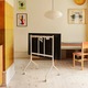 TV állvány kerekekkel, univerzális Pedestal, Moon Rollin' Regular, 40"-60" (101-152 cm) képátlóhoz, maximális terhelhetőség 50 kg, forgatható és csúszásmentes kerekek, könnyen összeszerelhető, szatén rozsdamentes acél, skandináv design, krém