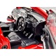 Mitsubishi Lancer Evo 9 piros modell 1:24 fém replika fényekkel és hangokkal, nyitható ajtók, motorháztető és csomagtartó