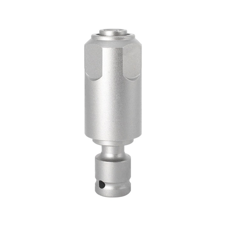 Adaptor care transforma o cheie de impact intr-o ciocana perforatoare, compatibil cu burghiele patrate SDS-Plus, pentru utilizare cu o cheie de impact