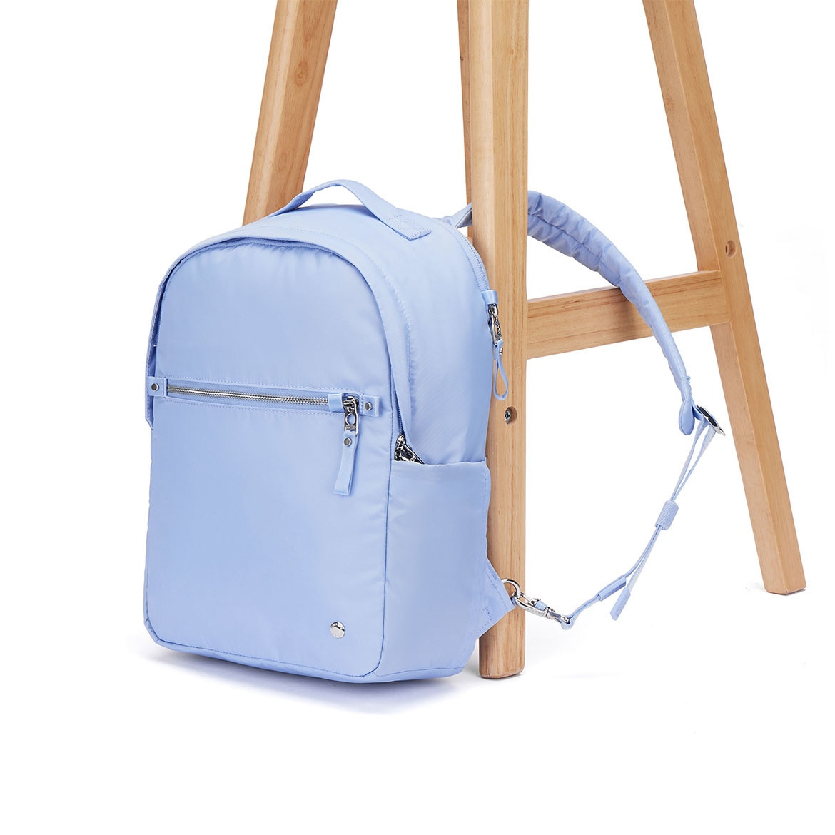 Rucsac antifurt dama Pacsafe W 10L, protectie RFID, compartiment pentru tableta 13”, albastru pastel