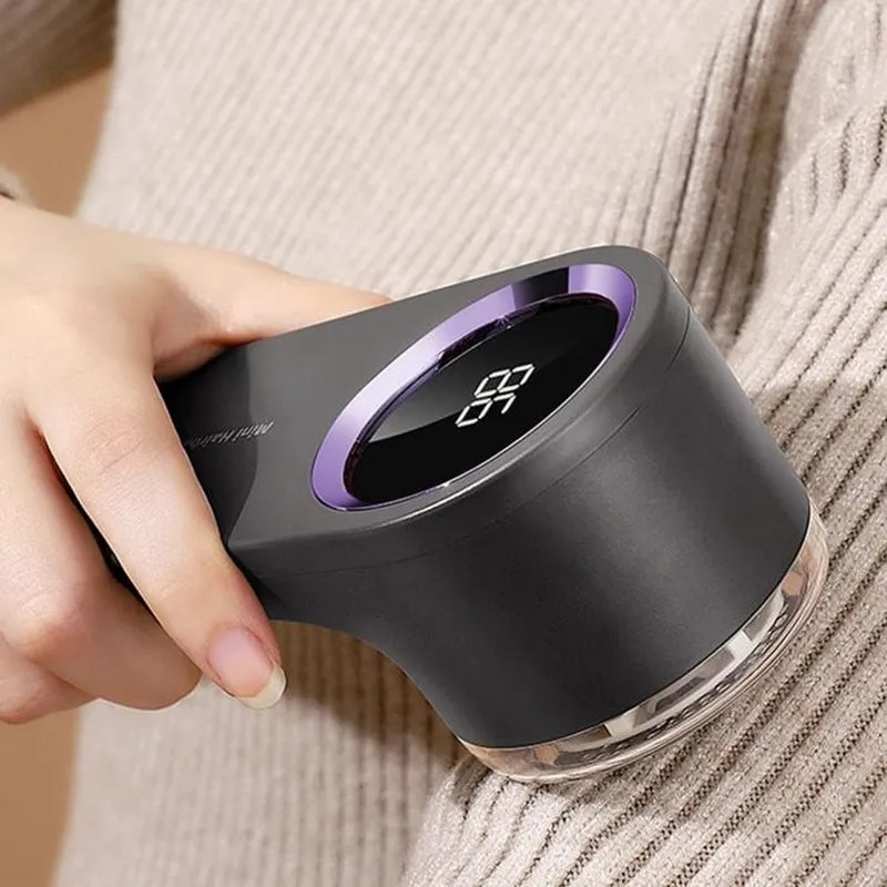 Perie anti-scame electrica pentru haine