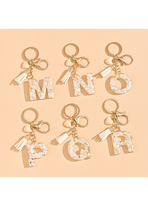 Kulcstartó/táskadísz műgyantából, monogrammal, dekoratív bojt és karabiner, fehér/arany