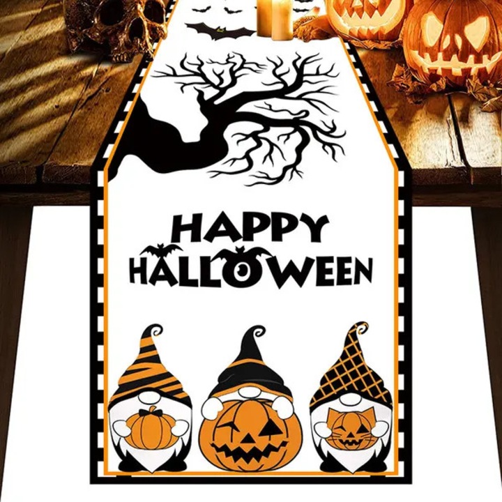 ISINI-CJ-K0497-260826-193 asztali futó, poliészter asztalterítő Halloween dizájnnal (gnómok és tökök), fehér/fekete/narancs, 183 x 33 cm
