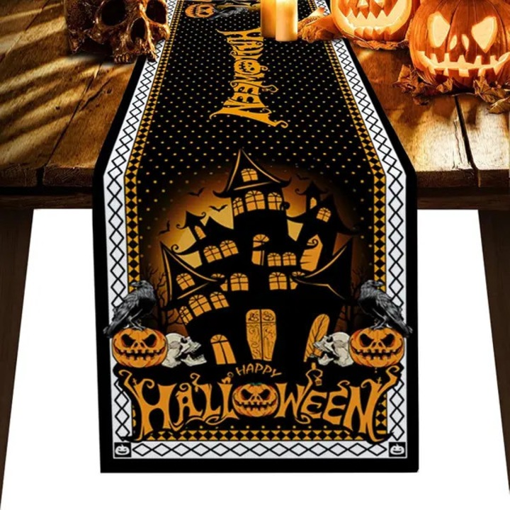 ISINI-CJ-K0497-260826-2602 asztali futó, pamut és len, Halloween mintás kísértetházzal és tökökkel, fekete/narancs, 33 x 183 cm