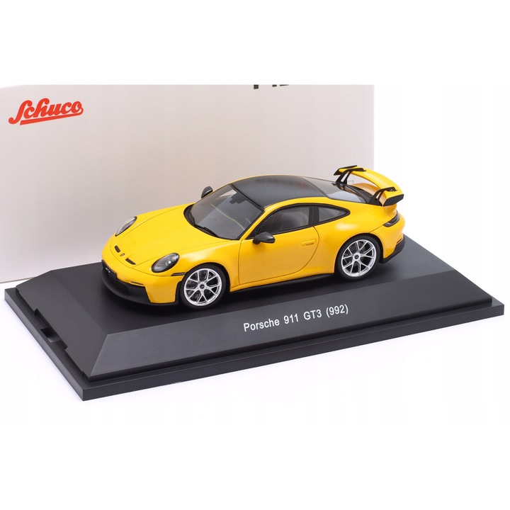 Porsche 911 992 GT3 Schuco modell, sárga, 1:43, gyanta, talapzaton akril vitrinnel