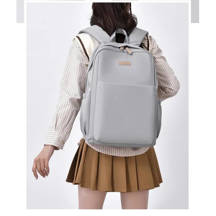 Rucsac in material durabil, capacitate mare, compartiment pentru laptop si iPad, buzunare laterale, model IZO-CJ-K0502-2026-0721-6901, bej deschis