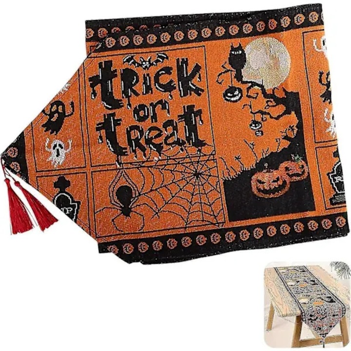 ISINI-CJ-K0497-260826-2901 asztali futó, dekoratív Halloween "Trick or Treat" mintával, tökökkel, pókkal, fekete macskákkal és rojtokkal, narancssárga/fekete