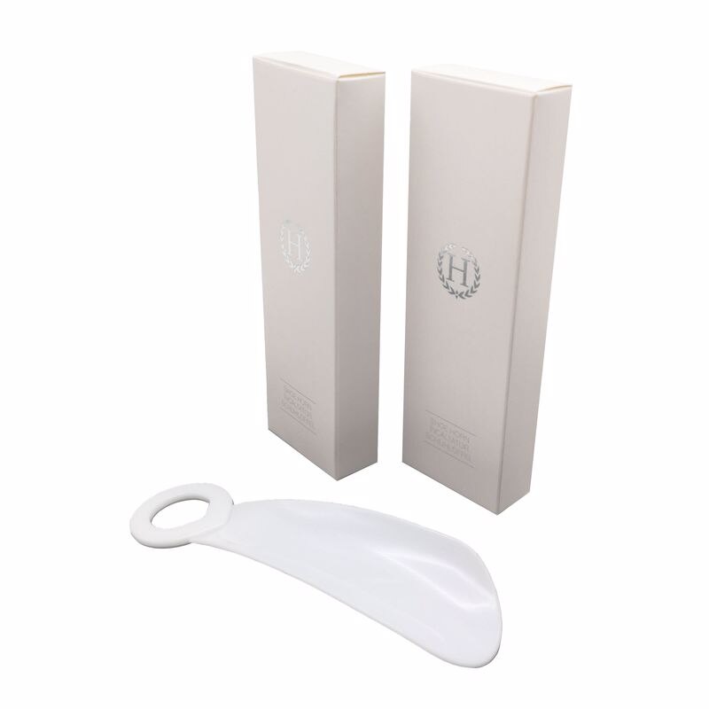 Set 100 bucati incaltator de pantofi,plastic,alb,ambalat in cutie de carton 'H' alba,brand AMS