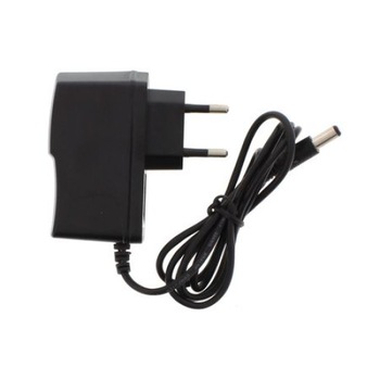 Alimentator 12V - 1,5 a cadou 1 cablu scart - scart Alimentator 12V - 1,5 a cadou 1 cablu scart - scart