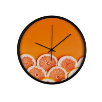 ceas perete produs dekostore pentru bucatarie cu mecanism silentios felii de grepfruit pe fundal portocaliu diametru 30 cm rama neagra din plastic imagen 15_0_
0