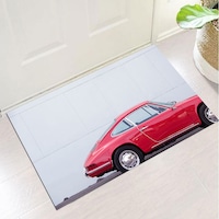 covor intrare impermeabil pres pvc art factory masina rosie langa cladire alba 50 x 70 cm imagen 3_0_
0