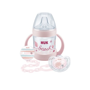 Set 3 piese biberon 150 ml, suzeta si lant pentru suzeta 6-18 luni Nuk Beach 225182, Roz Set 3 piese biberon 150 ml, suzeta si lant pentru suzeta 6-18 luni Nuk Beach 225182, Roz
