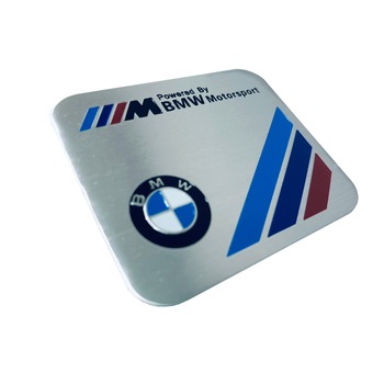 Emblema Adeziv Aluminiu Powered By BMW Motorsport 50mm X 60mm Emblema Adeziv Aluminiu Powered By BMW Motorsport 50mm X 60mm