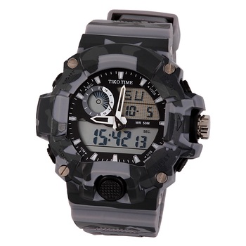 Ceas barbatesc Tiko Time, material plastic, mecanism quartz, culoare camuflaj gri, afisaj LCD Ceas barbatesc Tiko Time, material plastic, mecanism quartz, culoare camuflaj gri, afisaj LCD